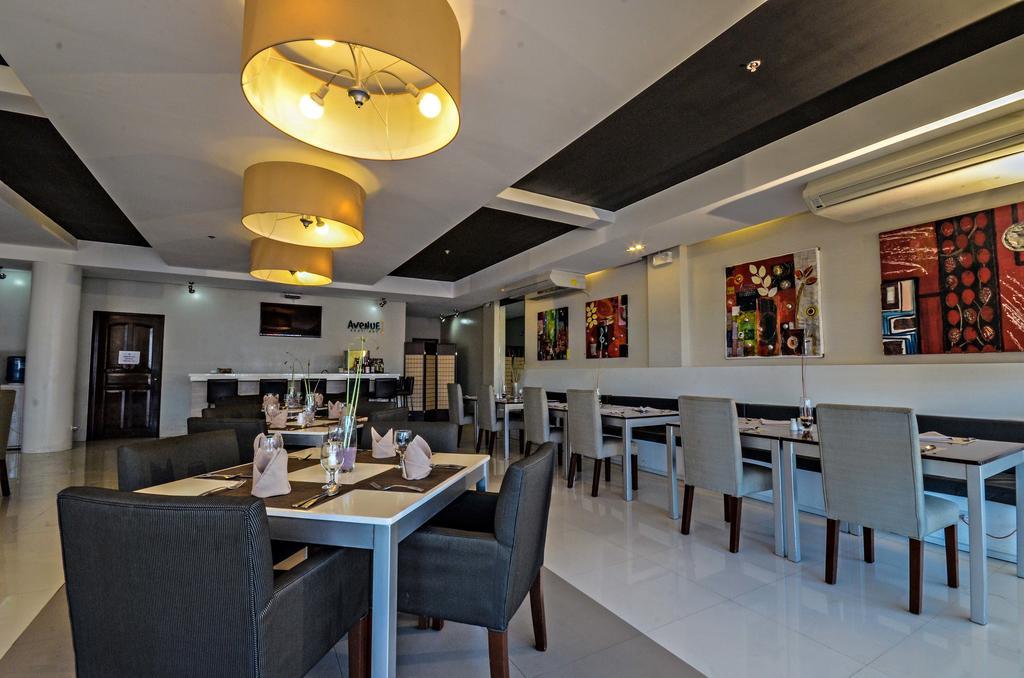 Empire Suites Hotel Puerto Princesa Bagian luar foto