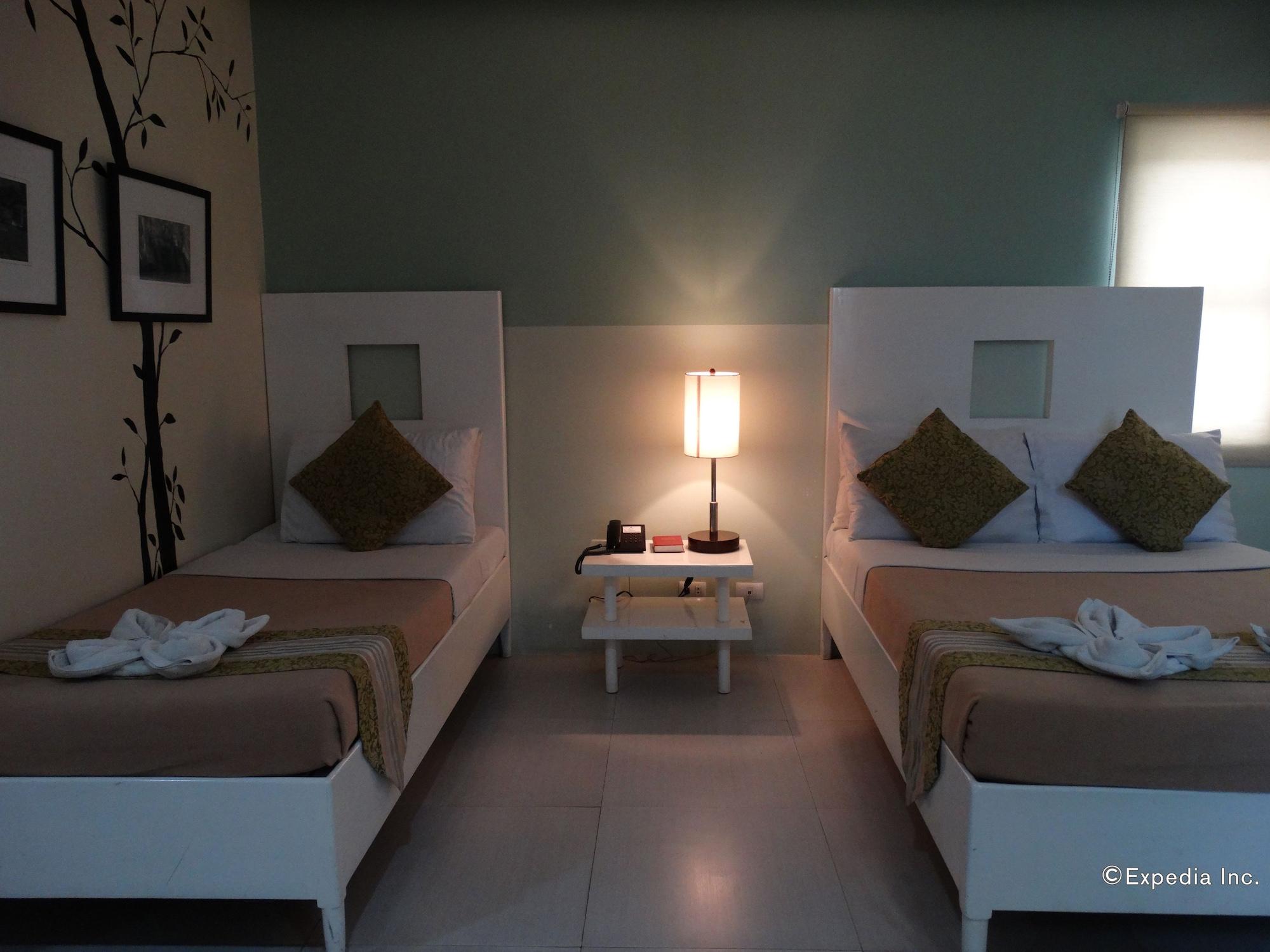 Empire Suites Hotel Puerto Princesa Bagian luar foto