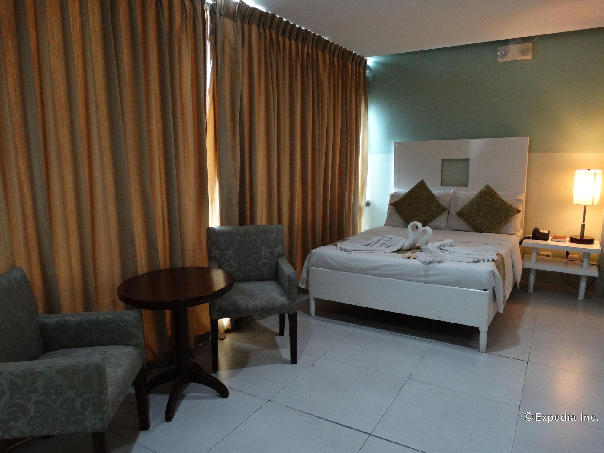 Empire Suites Hotel Puerto Princesa Bagian luar foto