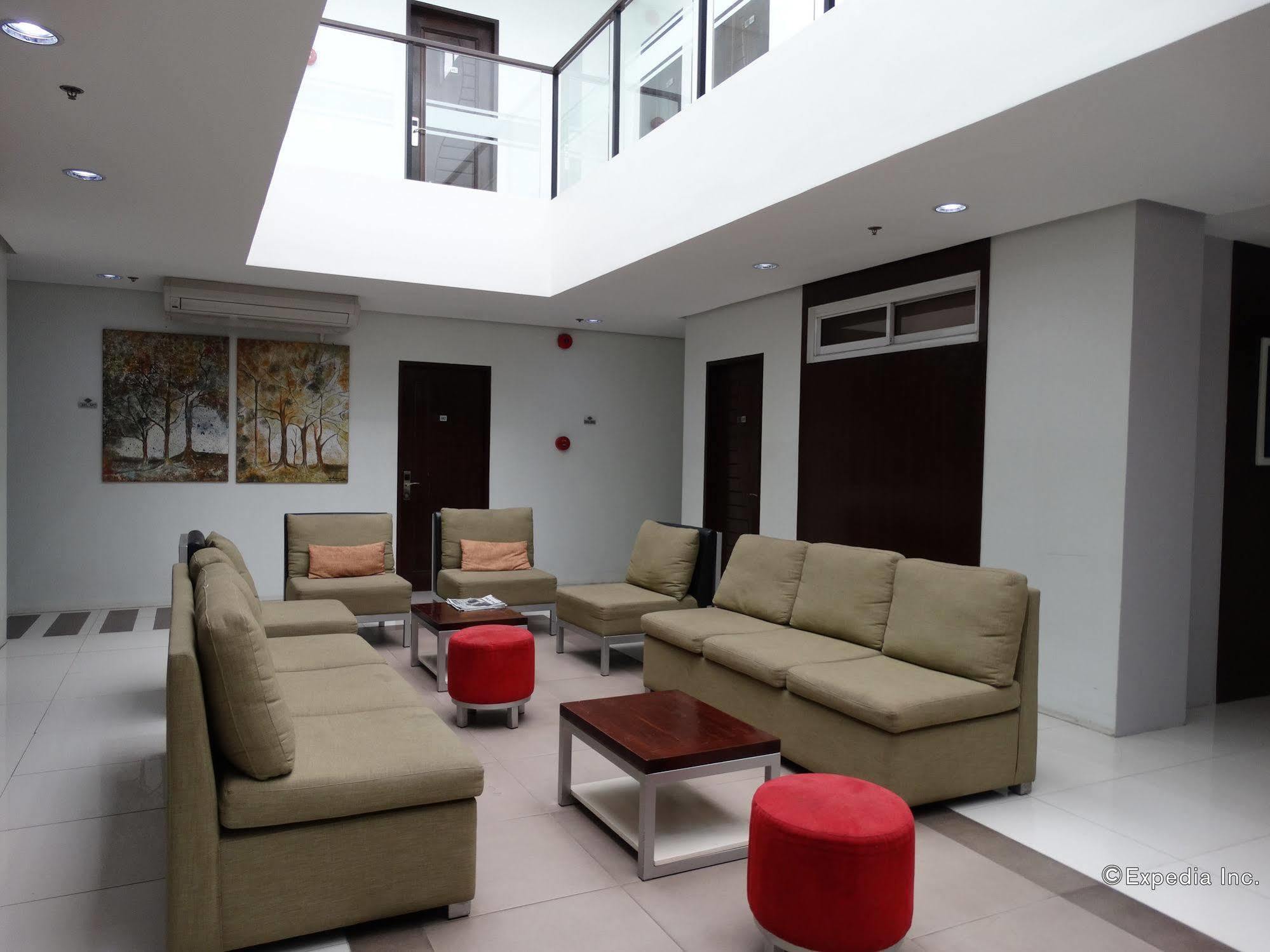Empire Suites Hotel Puerto Princesa Bagian luar foto